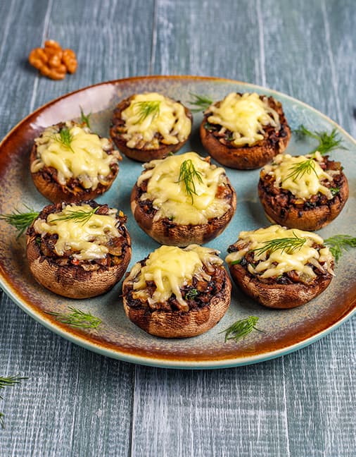 Receta de Criminis rellenos con tocineta y queso en Champiñones Setas de Cuivá
